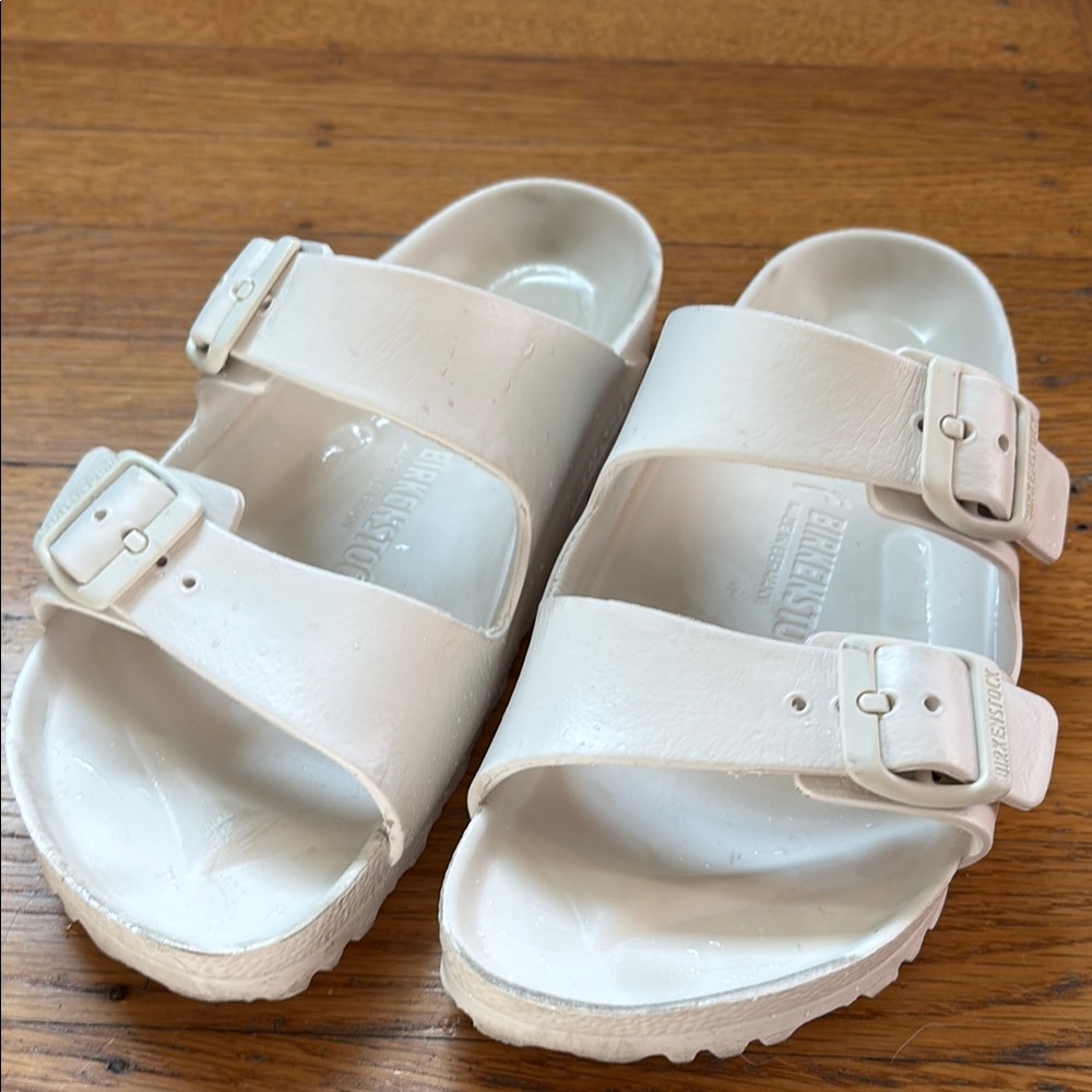 Birkenstock White Sandals with Adjustable Straps and Contoured Footbed